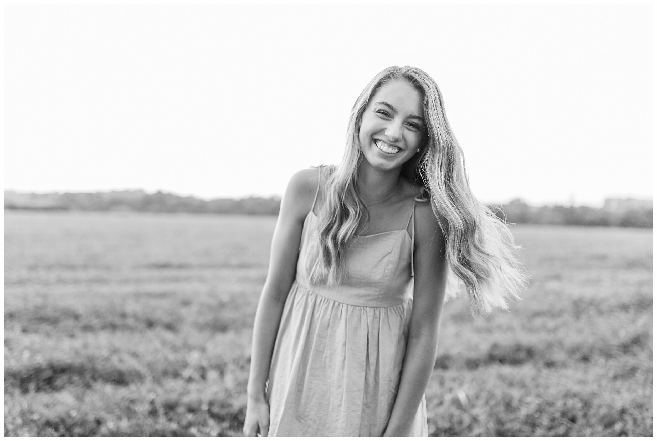 senior session in a field at lexington ky