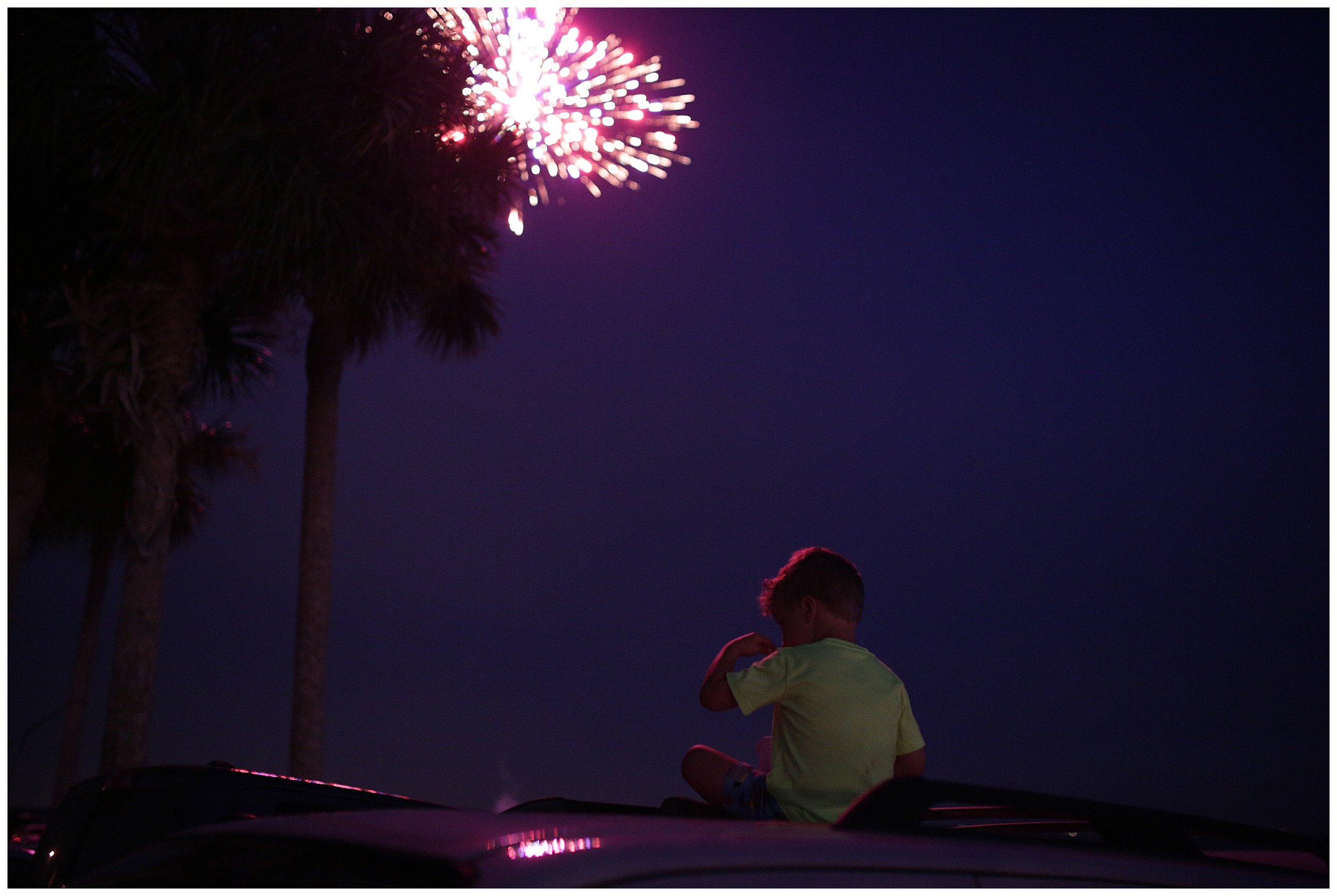 boy watching fireworks